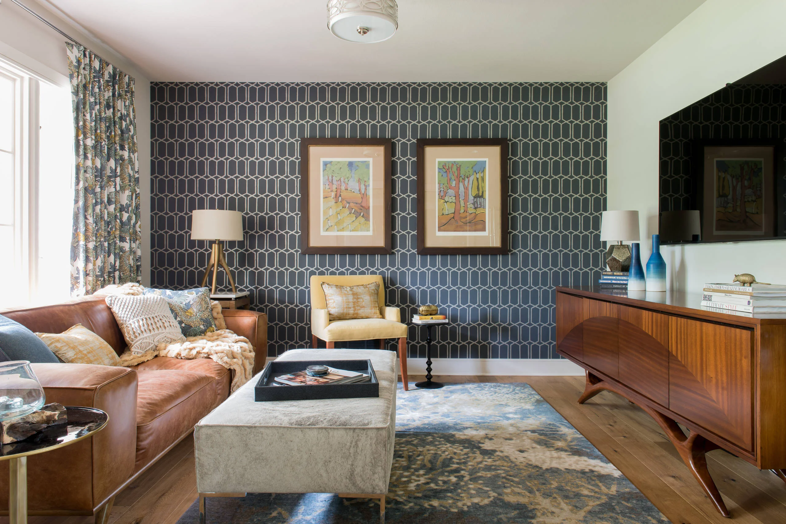 Professional wallpaper installer carefully aligning a patterned wallpaper on a bedroom wall