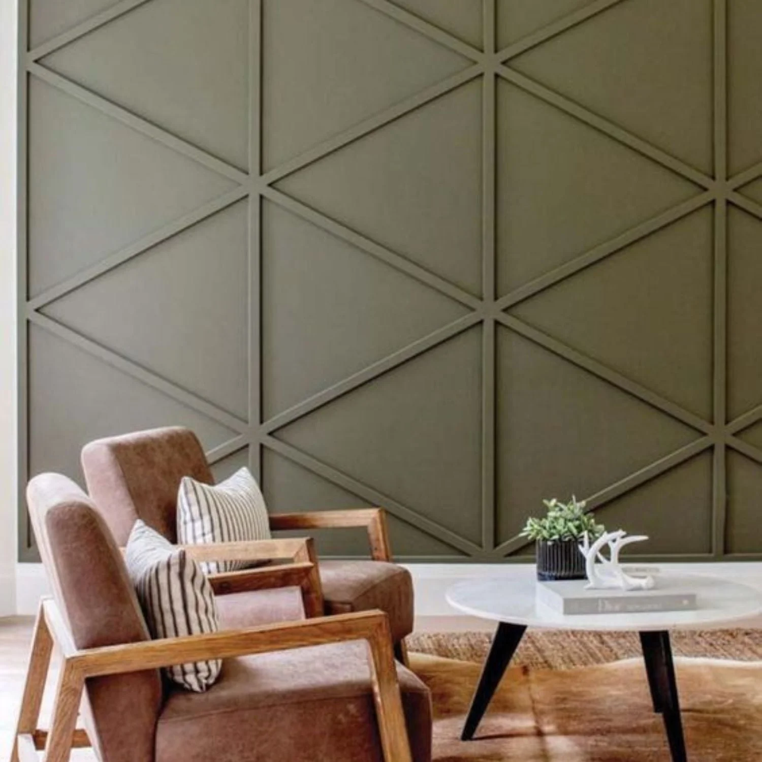 Artisan creating a premium golden texture finish on a feature wall